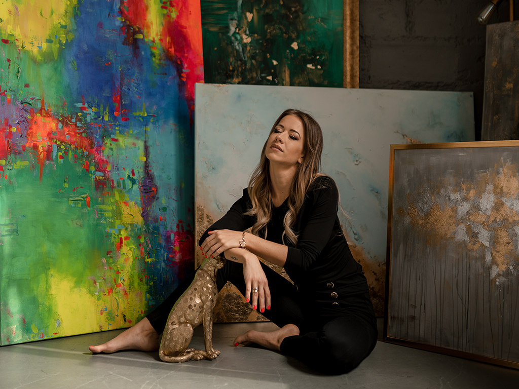 Adél with a painting